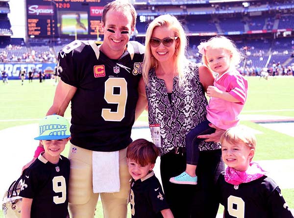 Image of Brittany Brees with her husband and with kids