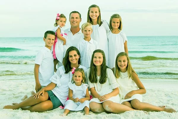 Image of Tiffany Rivers with husband Philip along with their kids